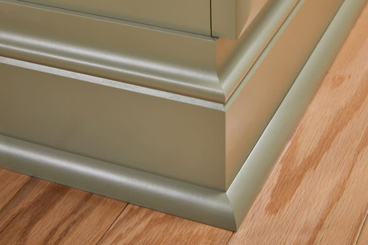 These Green and Light cabinets for the 2019 Exhibit Booth home were provided by Wellborn Cabinet, Inc.