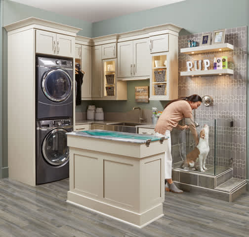 A Medium Density Fiberboard Pet Suites featuring Saybrook cabinet doors in Gray Mist Granite from Wellborn Cabinet, Inc.