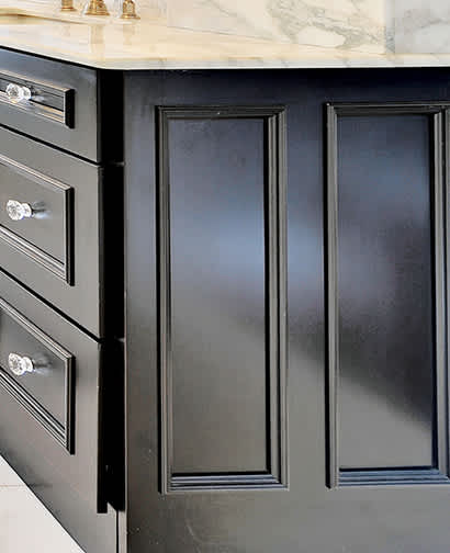 These Dark and Black cabinets for the 2014 Echelon and Residential Home home were provided by Wellborn Cabinet, Inc.