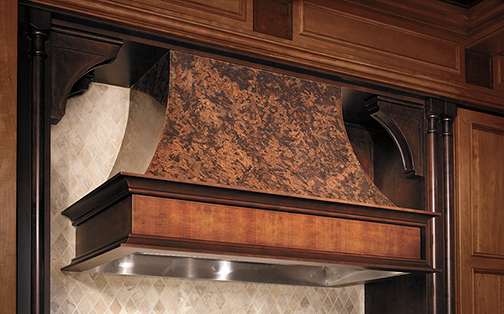 These Brown and Medium cabinets for the 2012, 2011, and 2010 Exhibit Booth home were provided by Wellborn Cabinet, Inc.