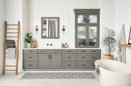 A Maple Bath featuring Prairie cabinet doors in Willow from Wellborn Cabinet, Inc.