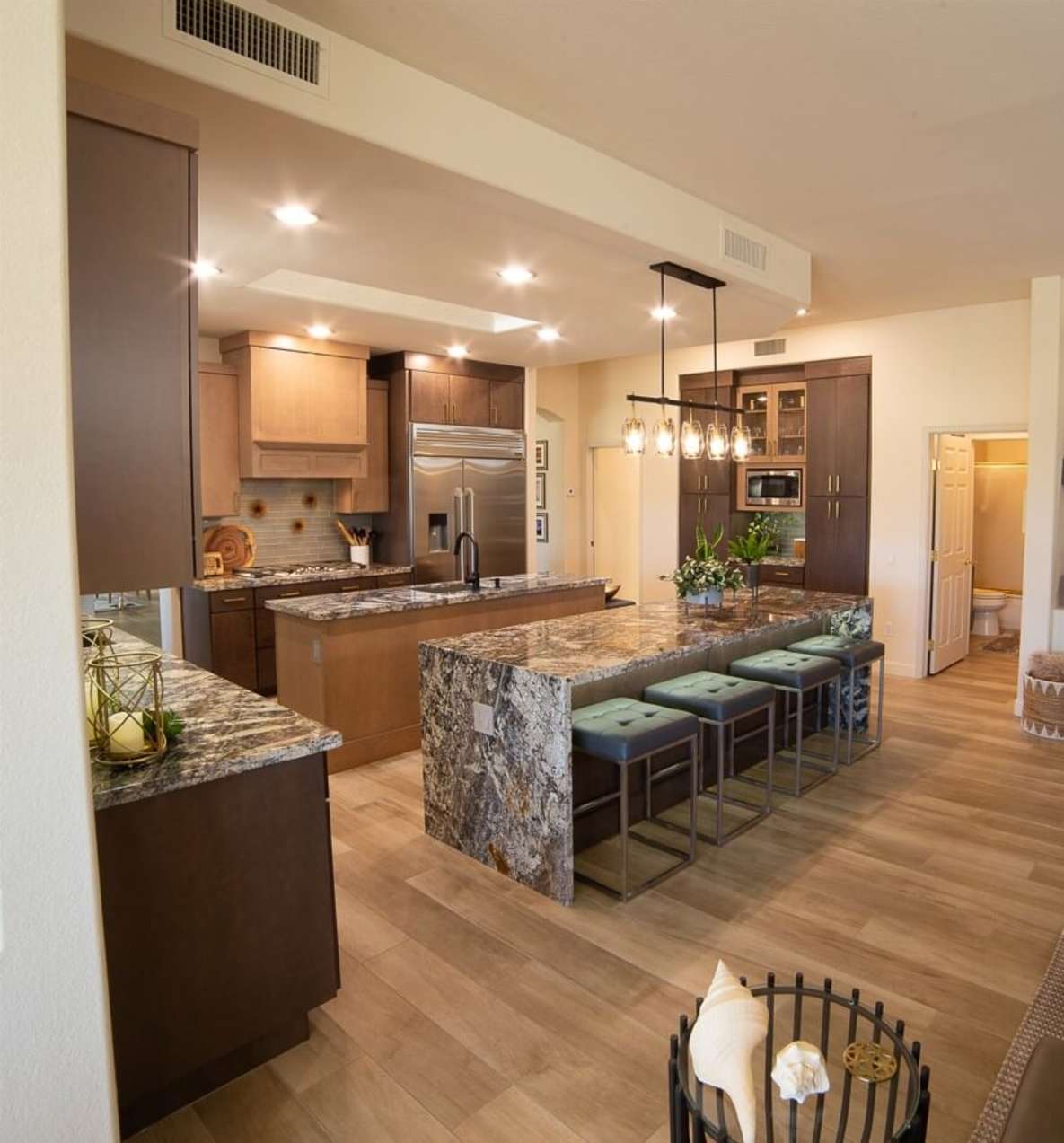 modern kitchen with natural tone cabinets