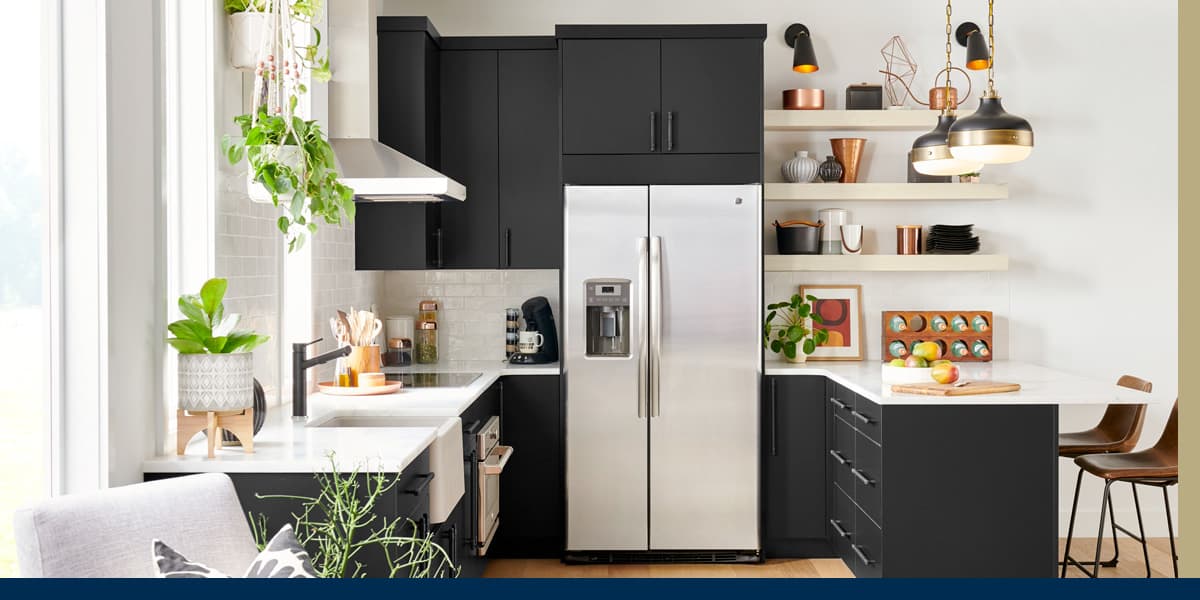 dark-wellborn-cabinets-against-a-white-ktichen-wall