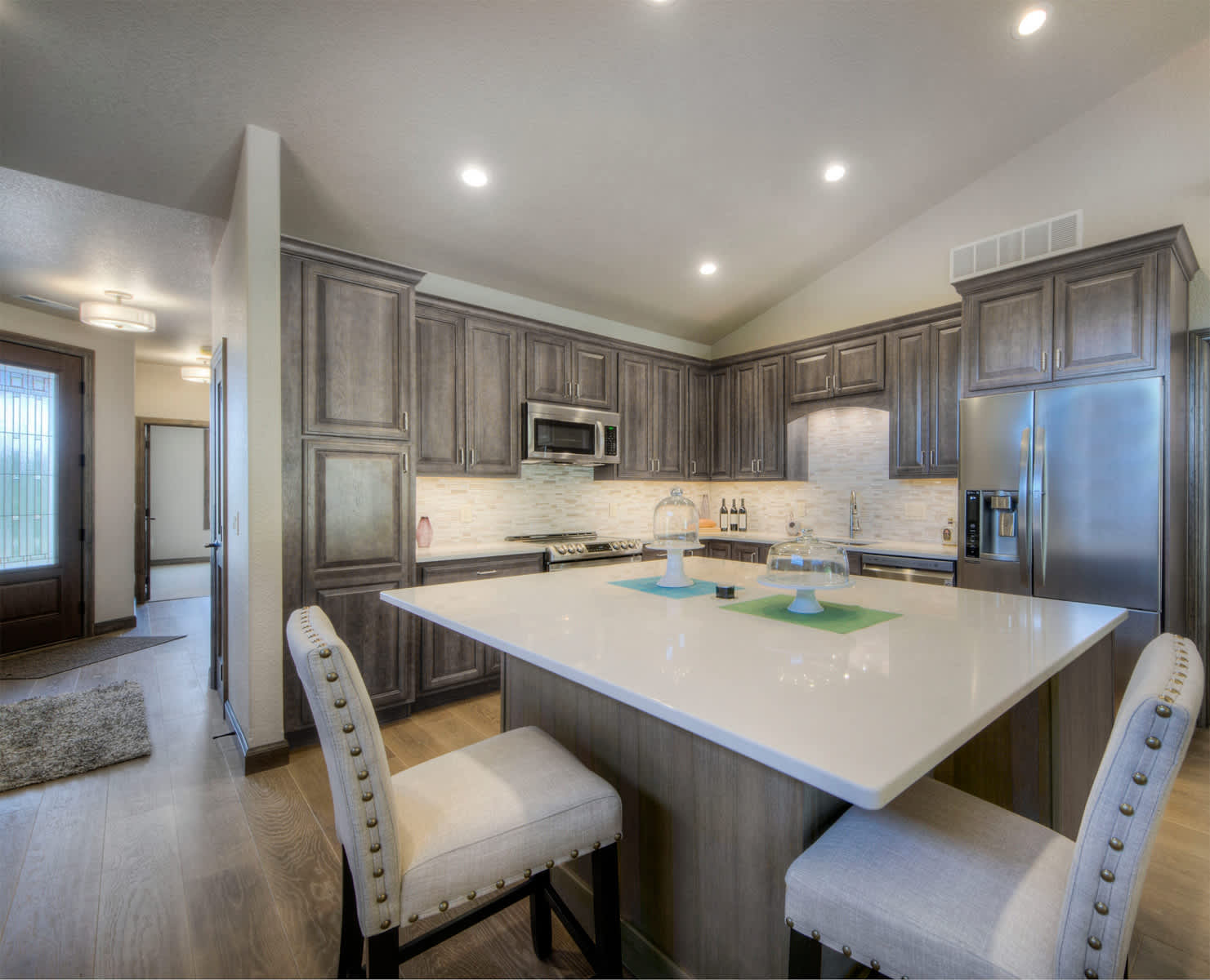 A Hickory Kitchen featuring Rose Hall Square cabinet doors in Drift from Wellborn Cabinet, Inc.