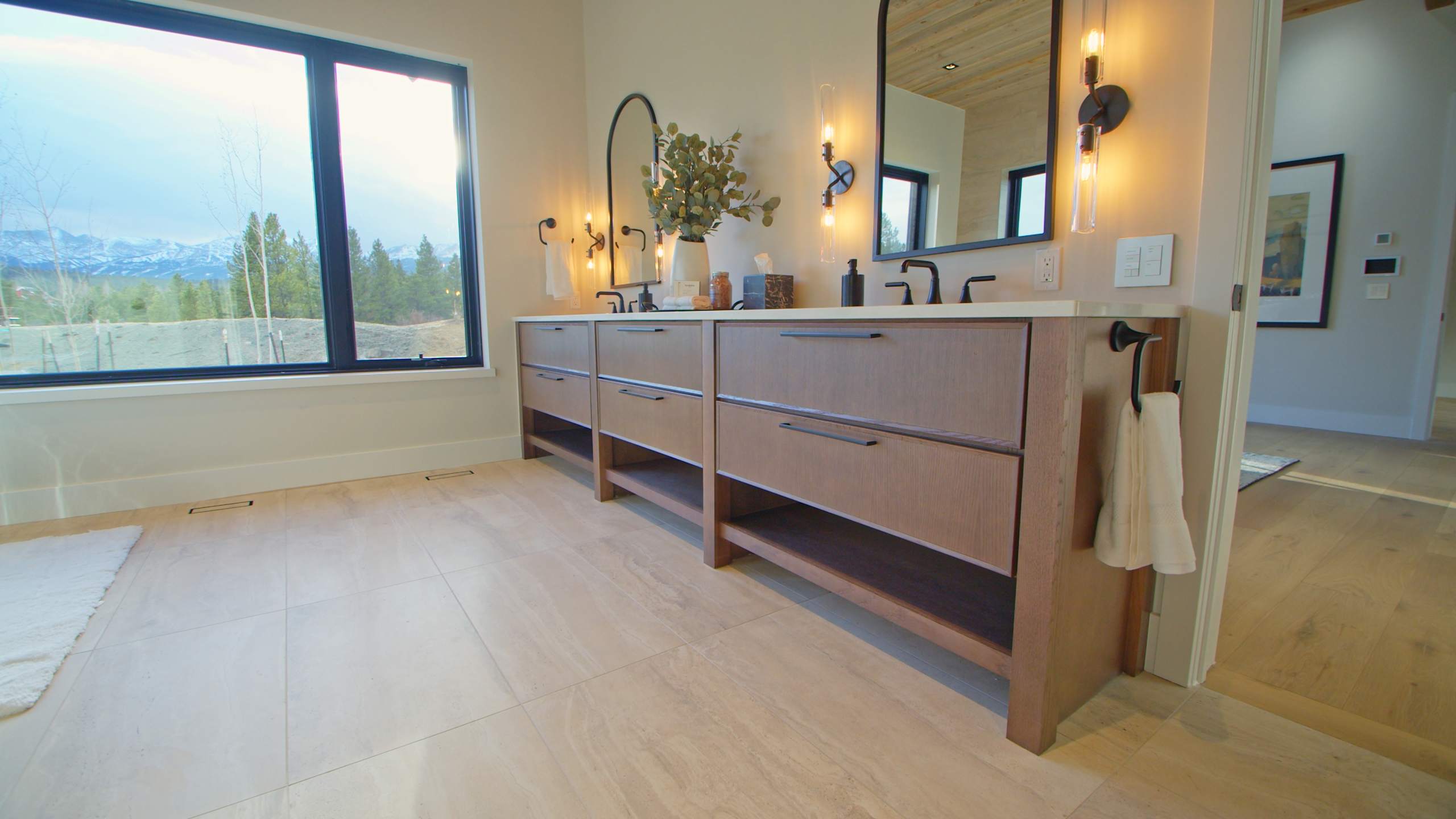 A Oak Bath featuring Muriel cabinet doors in River Rock from Wellborn Cabinet, Inc.