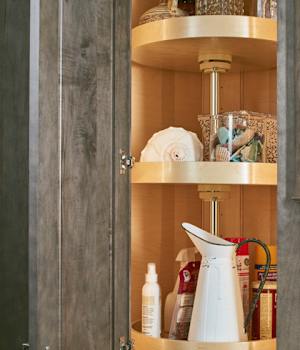 These Medium and Gray cabinets for the 2021 Exhibit Booth home were provided by Wellborn Cabinet, Inc.