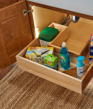 These Brown and Light cabinets for the 2021 Exhibit Booth home were provided by Wellborn Cabinet, Inc.