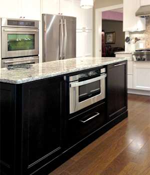 These Dark and Brown cabinets for the 2013 Design Contest and Residential Home home were provided by Wellborn Cabinet, Inc.