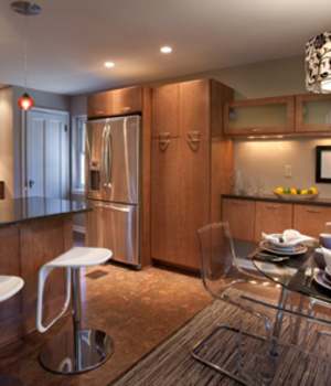 A Maple Kitchen featuring Milan cabinet doors in Medium from Wellborn Cabinet, Inc.