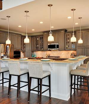 A Maple Kitchen featuring Melrose cabinet doors in Oatmeal Charcoal from Wellborn Cabinet, Inc.