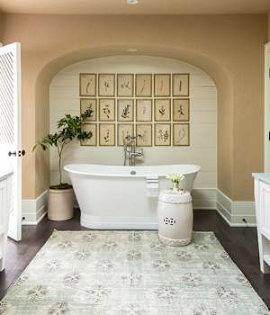 A Maple Bath featuring Henlow Square cabinet doors in Glacier from Wellborn Cabinet, Inc.