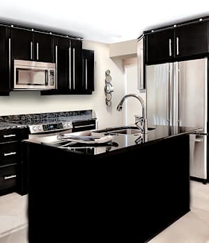 A Medium Density Fiberboard Kitchen featuring Alto cabinet doors in Onyx from Wellborn Cabinet, Inc.