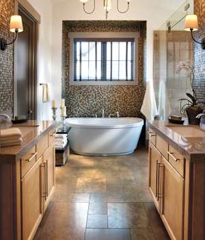 A Maple Bath featuring Henlow Square cabinet doors in Ginger from Wellborn Cabinet, Inc.