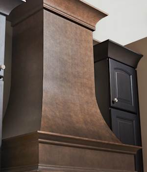 These Gray cabinets for the 2019 Exhibit Booth home were provided by Wellborn Cabinet, Inc.