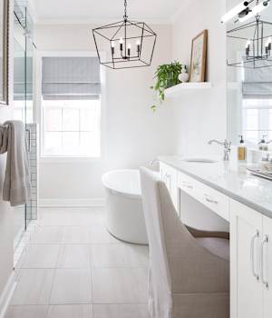A Medium Density Fiberboard Bath featuring Hancock cabinet doors in Glacier from Wellborn Cabinet, Inc.