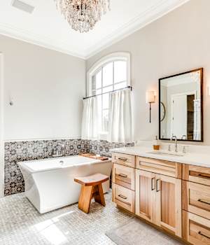 A Hickory Bath featuring Hanover cabinet doors in Natural from Wellborn Cabinet, Inc.