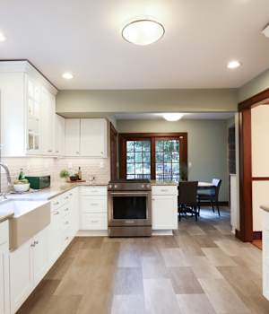 A Maple Kitchen featuring Prairie cabinet doors in Glacier from Wellborn Cabinet, Inc.