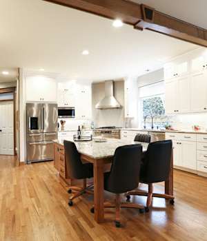 A Maple Kitchen featuring Prairie cabinet doors in Glacier and Ginger from Wellborn Cabinet, Inc.