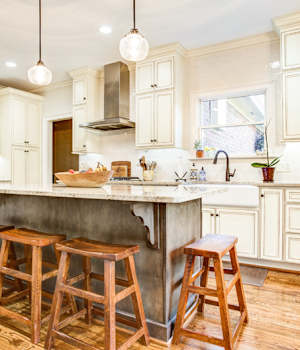 A Maple Kitchen featuring Harmony cabinet doors in Divinity Java and Drift from Wellborn Cabinet, Inc.