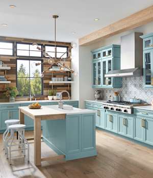 A Maple Kitchen featuring Amelia cabinet doors in Glacier and Aqua from Wellborn Cabinet, Inc.