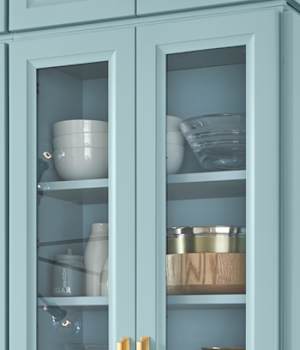 These Light and Blue cabinets for the 2019 Photo Shoot home were provided by Wellborn Cabinet, Inc.