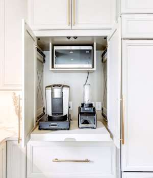 These Beige and Light cabinets for the 2020 Creative Cabinets & Design and Cash for Photos home were provided by Wellborn Cabinet, Inc.