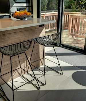 Bel-Air is Decorative Laminate Veneer Door door group with a Slab cabinet door from Wellborn Cabinet.