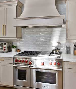 These Gray and Medium cabinets for the 2020 Residential Home and Cash for Photos home were provided by Wellborn Cabinet, Inc.