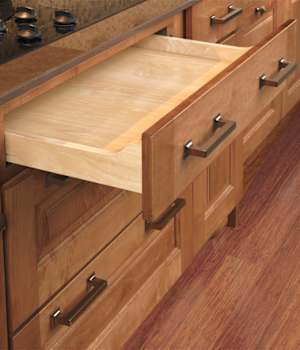 These Brown and Light cabinets for the 2012, 2011, and 2010 Exhibit Booth home were provided by Wellborn Cabinet, Inc.