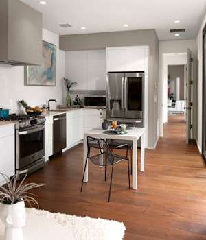 Midtown is Decorative Laminate Veneer Door door group with a Slab cabinet door from Wellborn Cabinet.