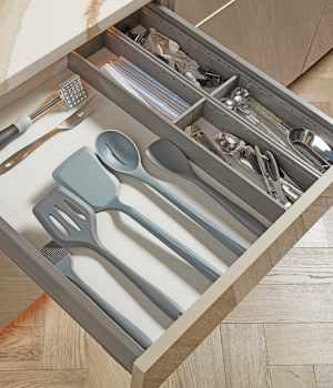 Midtown is Decorative Laminate Veneer Door door group with a Slab cabinet door from Wellborn Cabinet.