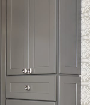 These Gray and Medium cabinets for the 2021 Exhibit Booth home were provided by Wellborn Cabinet, Inc.