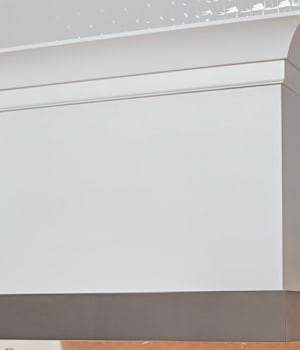 These White and Light cabinets for the 2021 Exhibit Booth home were provided by Wellborn Cabinet, Inc.