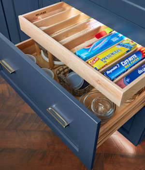 These Blue and Medium cabinets for the 2021 Exhibit Booth home were provided by Wellborn Cabinet, Inc.