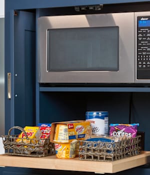 These Blue and Medium cabinets for the 2021 Exhibit Booth home were provided by Wellborn Cabinet, Inc.