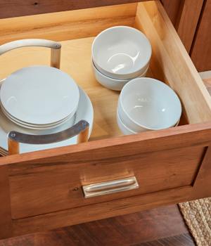 These Brown and Light cabinets for the 2021 Exhibit Booth home were provided by Wellborn Cabinet, Inc.