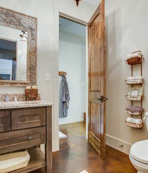A Character Maple Bath featuring Hanover cabinet doors in Drift from Wellborn Cabinet, Inc.