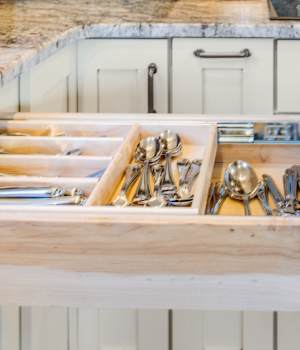 These Light and Beige cabinets for the 2020 Residential Home and Cash for Photos home were provided by Wellborn Cabinet, Inc.