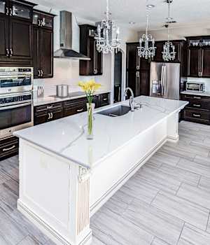 A Maple Kitchen featuring Harmony cabinet doors in Coffee and Glacier Java from Wellborn Cabinet, Inc.