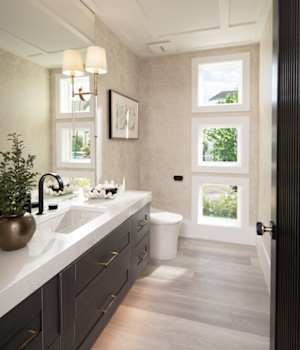 These Light and Brown cabinets for the 2022 The New American Home home were provided by Wellborn Cabinet, Inc.