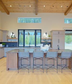 A Maple and Oak Kitchen featuring Muriel cabinet doors in Pebble and River Rock from Wellborn Cabinet, Inc.