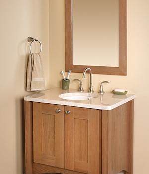 A Oak Bath featuring Hanover cabinet doors in Light from Wellborn Cabinet, Inc.