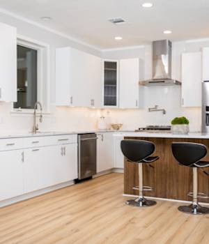 Midtown is Decorative Laminate Veneer Door door group with a Slab cabinet door from Wellborn Cabinet.