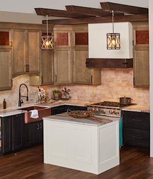 A Maple Kitchen featuring Amelia and Hanover cabinet doors in River Rock, Nightfall, and Glacier from Wellborn Cabinet, Inc.