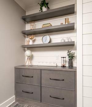 A Maple Living Room featuring Muriel cabinet doors in Castle from Wellborn Cabinet, Inc.
