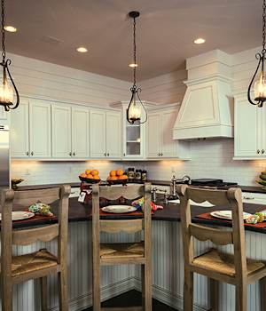 A Maple Kitchen featuring Monterey cabinet doors in Glacier from Wellborn Cabinet, Inc.