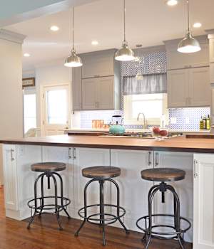 A Medium Density Fiberboard Kitchen featuring Chelsea II cabinet doors in Dove from Wellborn Cabinet, Inc.