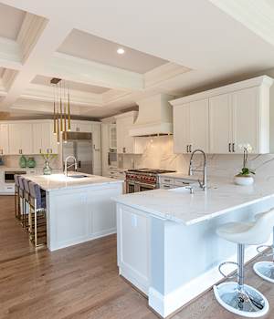 A Maple Kitchen featuring Henlow Square cabinet doors in Glacier from Wellborn Cabinet, Inc.