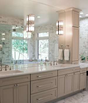 A Maple Bath featuring Napa cabinet doors in Pebble from Wellborn Cabinet, Inc.
