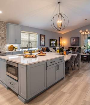 A Medium Density Fiberboard Kitchen featuring Saybrook cabinet doors in Dove from Wellborn Cabinet, Inc.